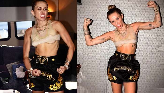 Майли Сайрус показала, как напрягает мышцы